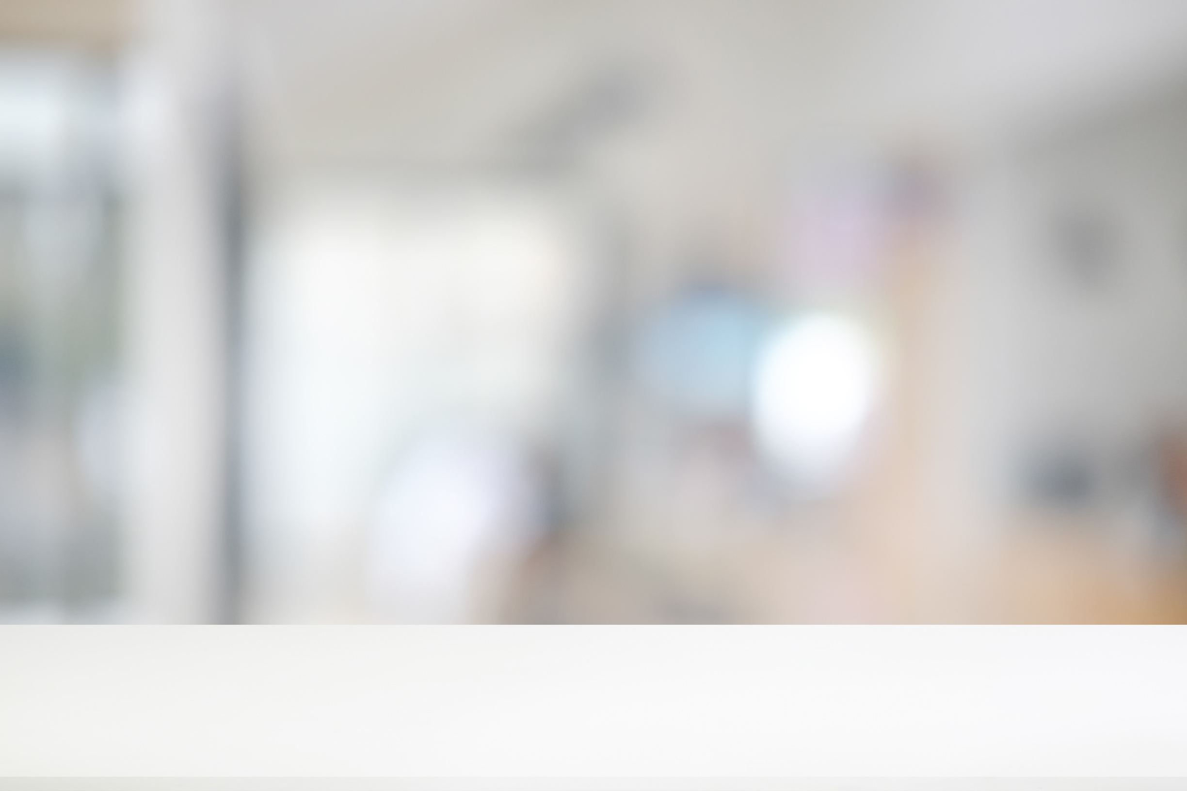 White table is empty with office blur background.